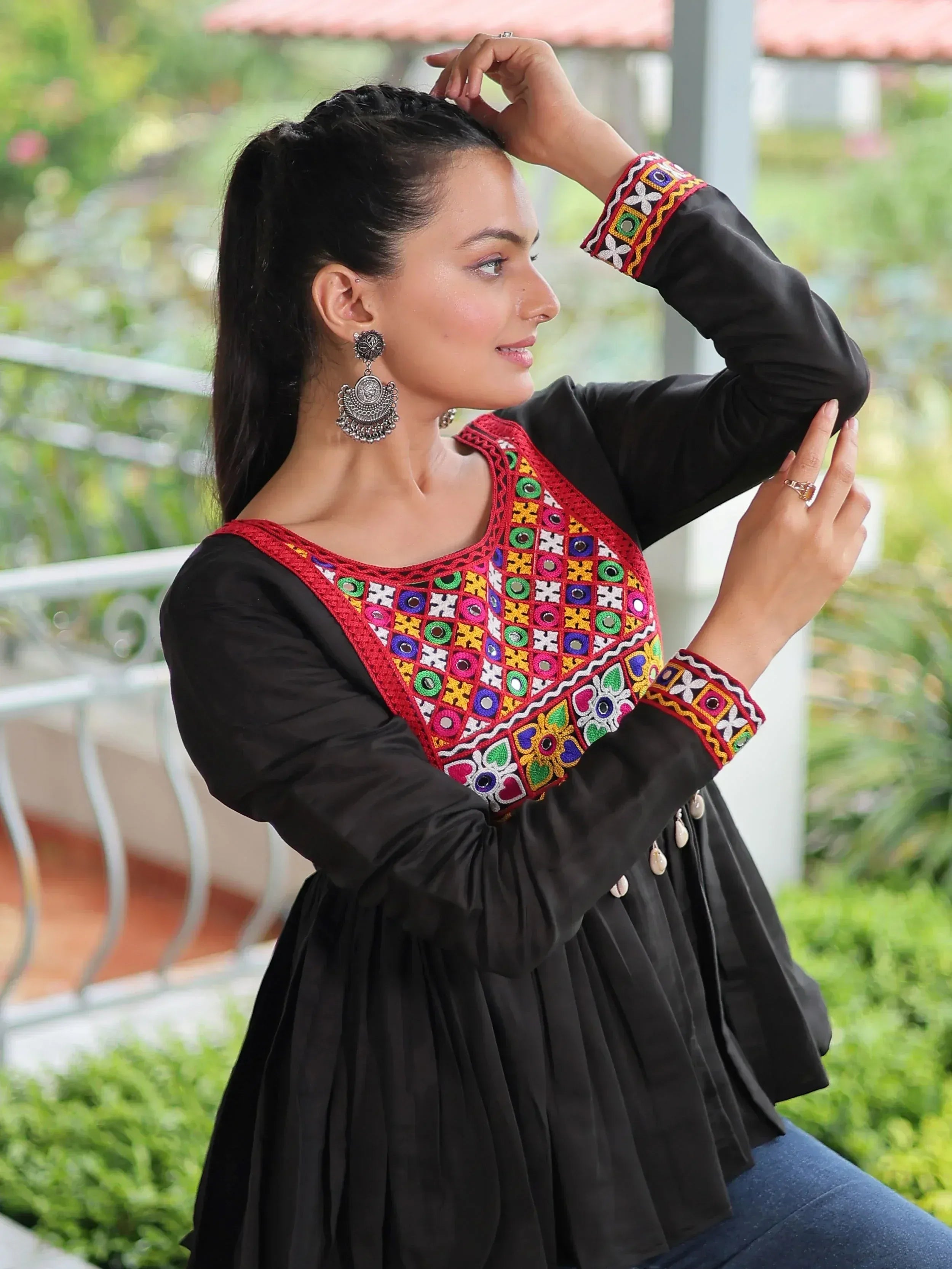 Black ethnic kurti with colorful mirror embroidery, perfect for Indian wear