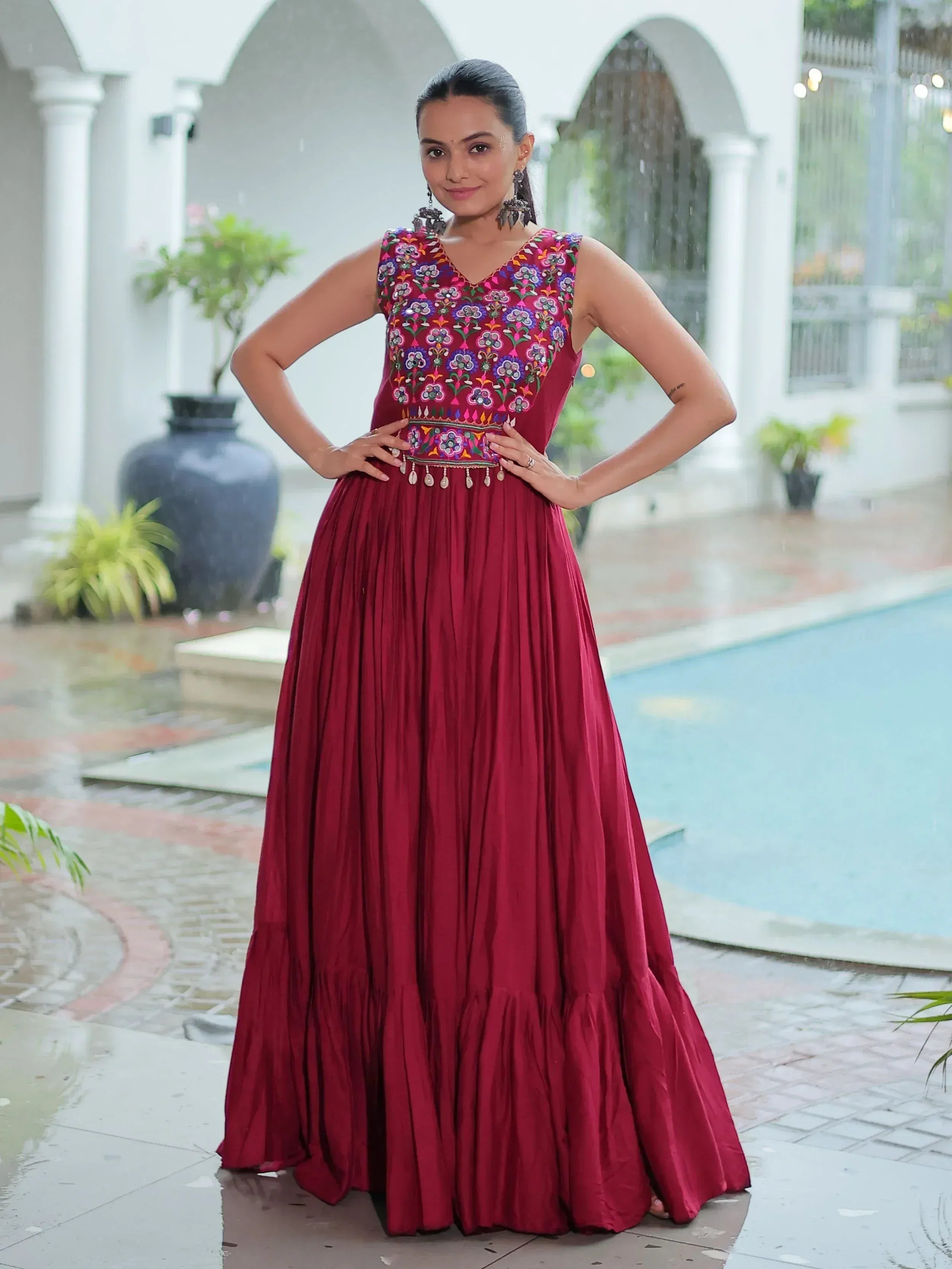 Maroon ethnic gown with floral embroidery, perfect for Indian occasions and events
