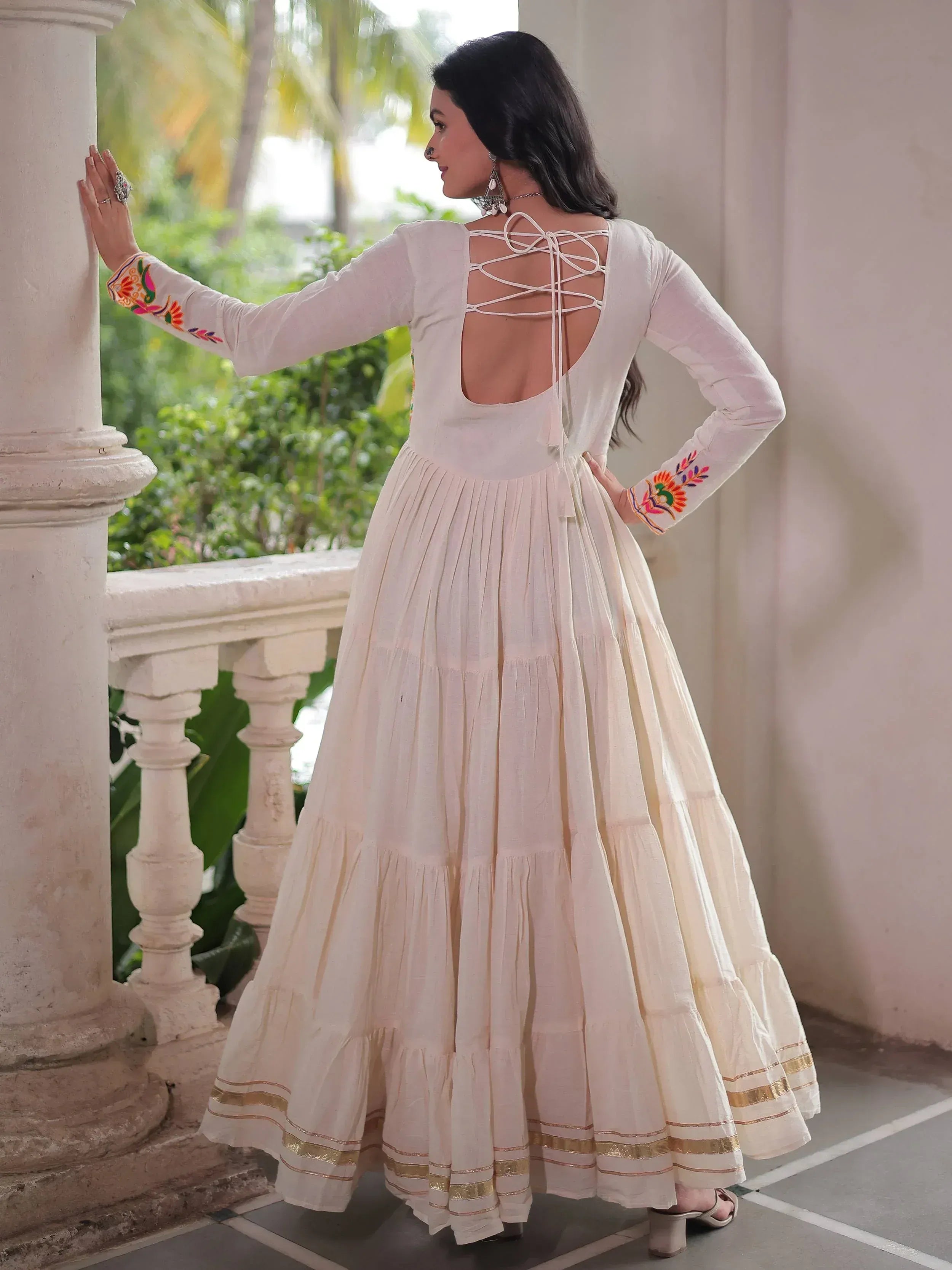 White ethnic gown with back lace-up and floral embroidery, perfect for Indian occasions