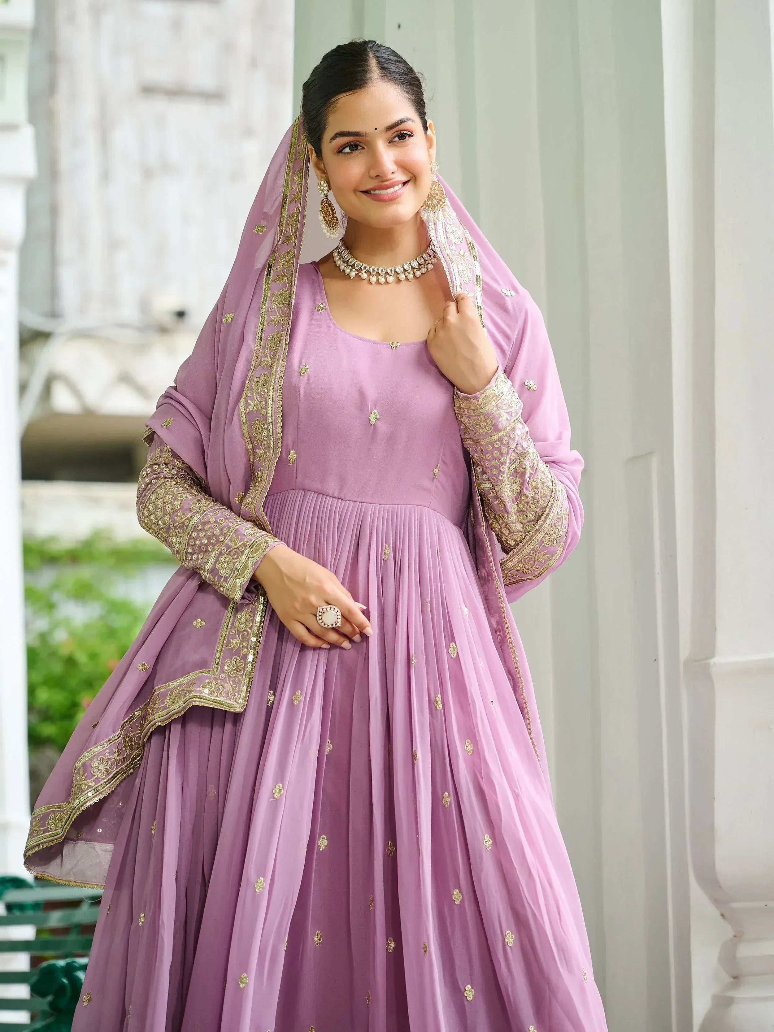 Elegant lavender anarkali with gold embroidery and matching dupatta, perfect for Indian ethnic wear.