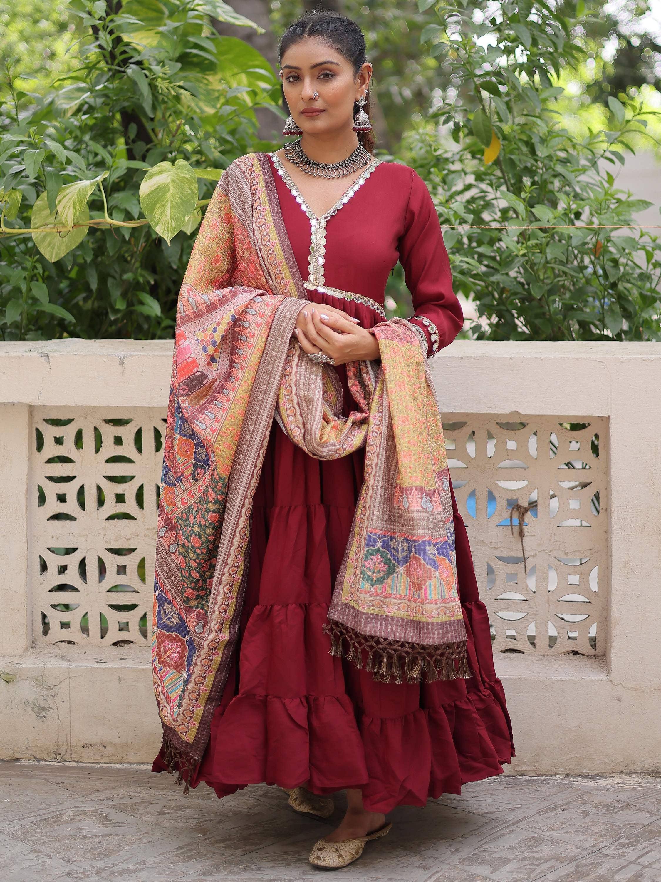 Maroon tiered ethnic gown with printed dupatta, perfect for Indian festive occasions