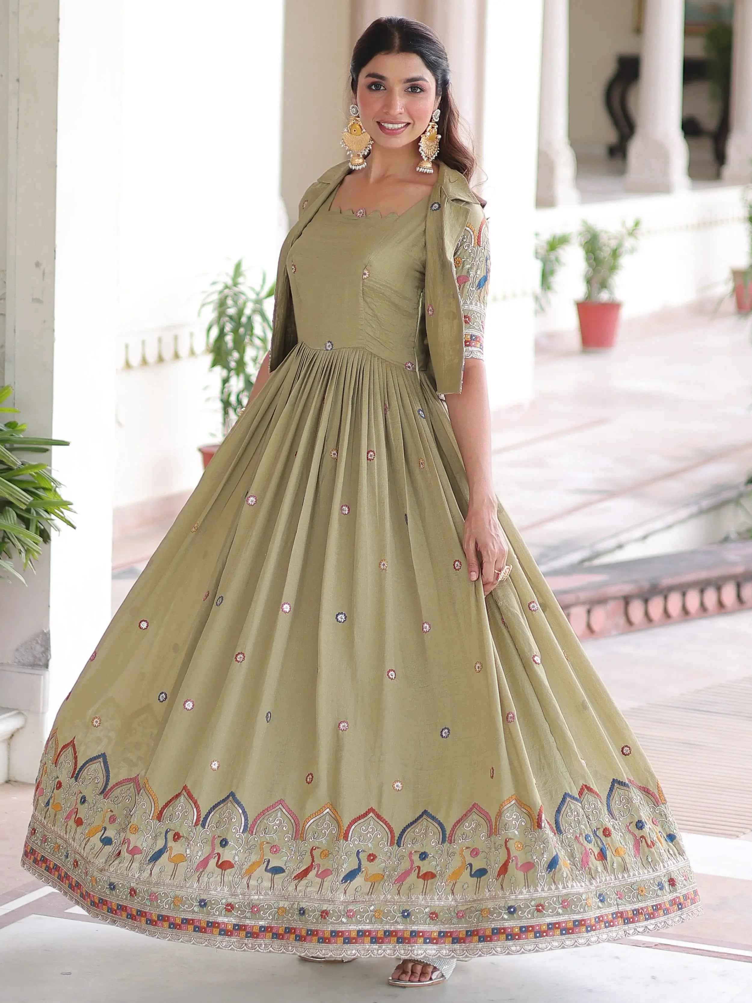Attractive Pista Embroidered Silk Festival Wear Gown With Koti