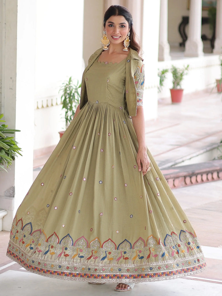 Attractive Pista Embroidered Silk Festival Wear Gown With Koti