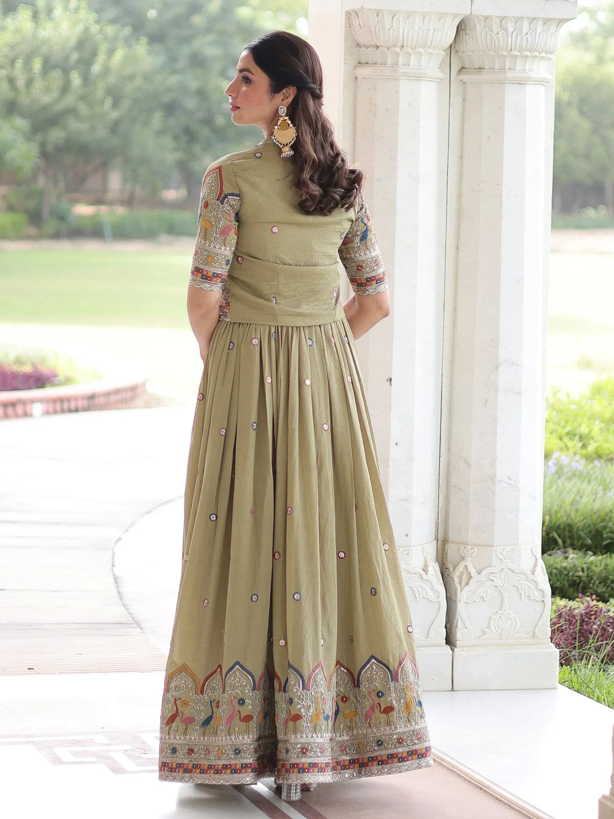 Olive green embroidered anarkali gown with colorful bird motifs, perfect for Indian ethnic wear.