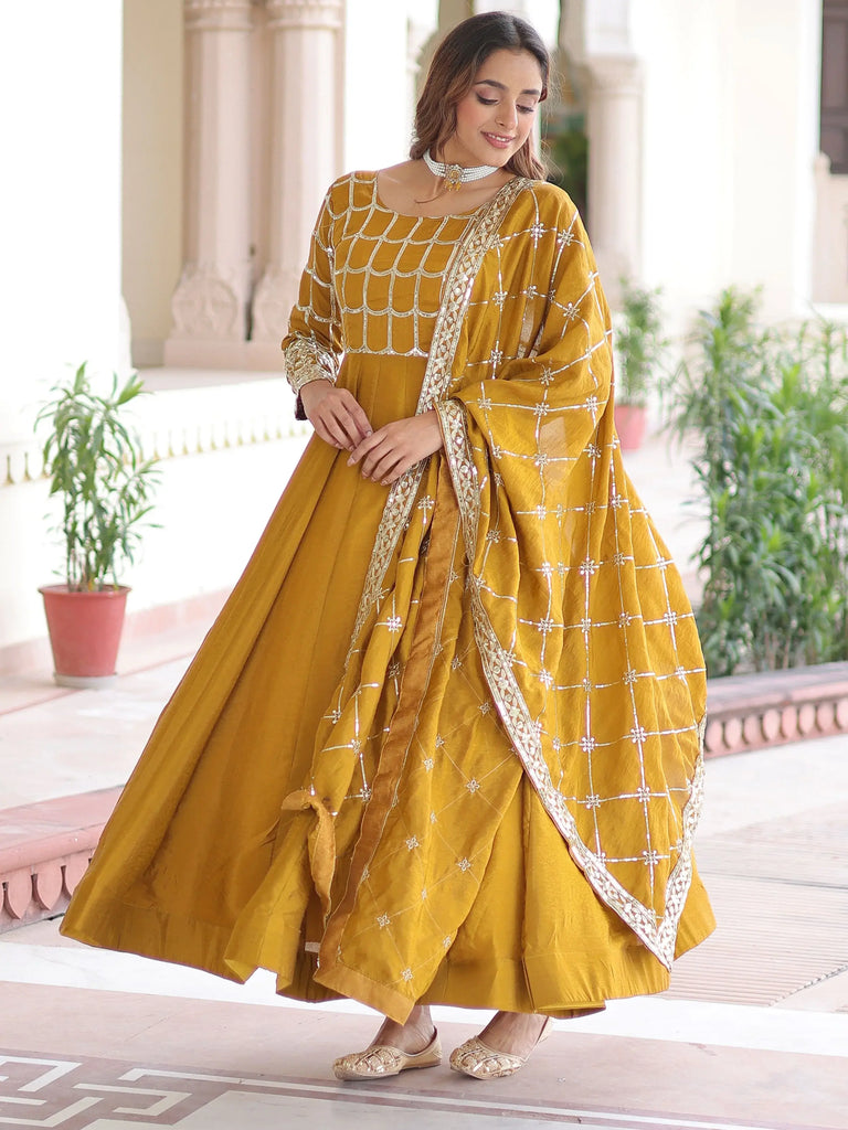 Stunning Mustard Sequins Silk Festival Wear Gown With Dupatta