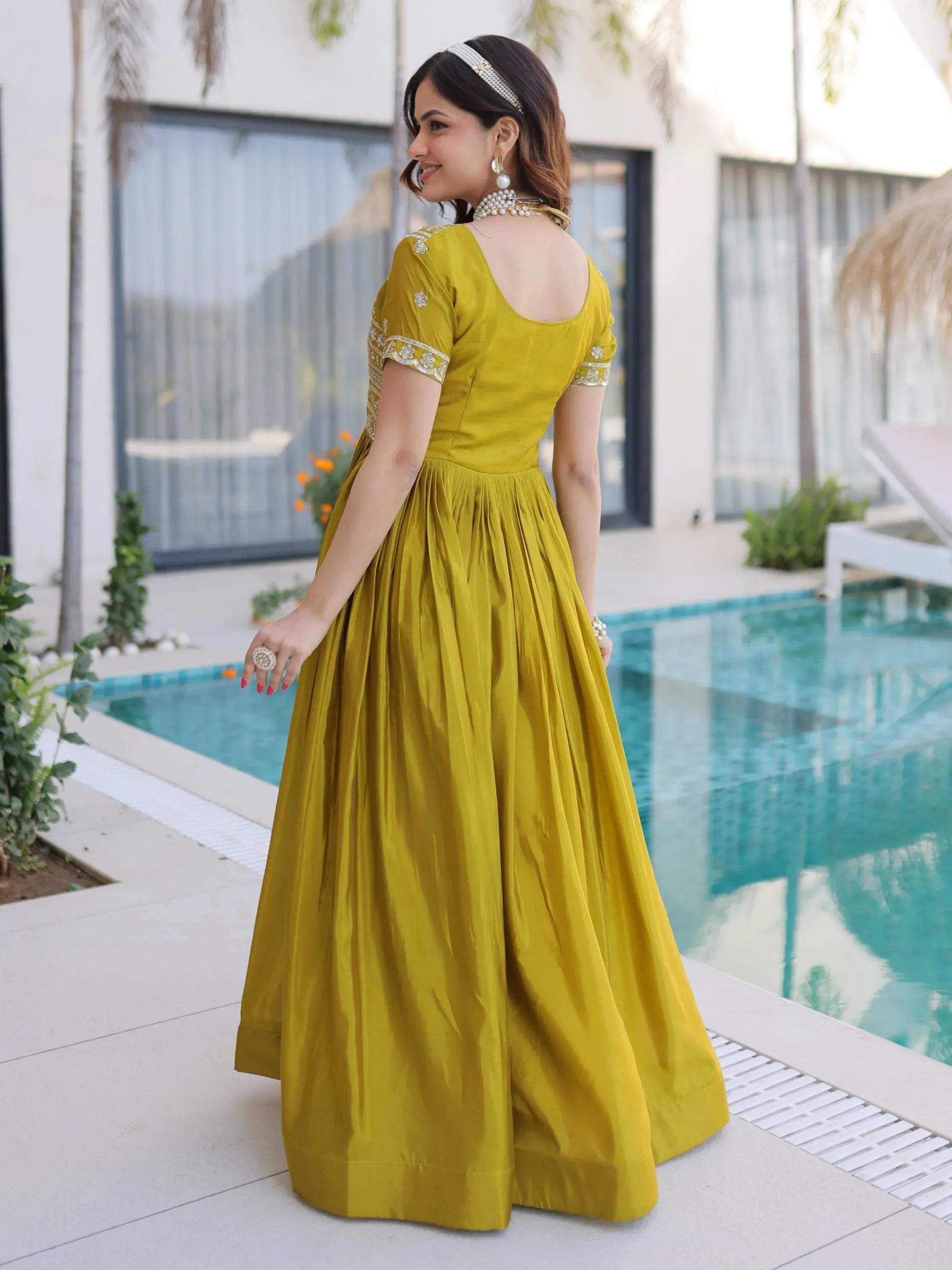 Astonishing Olive Green Zari Work Silk Mehendi Wear Gown