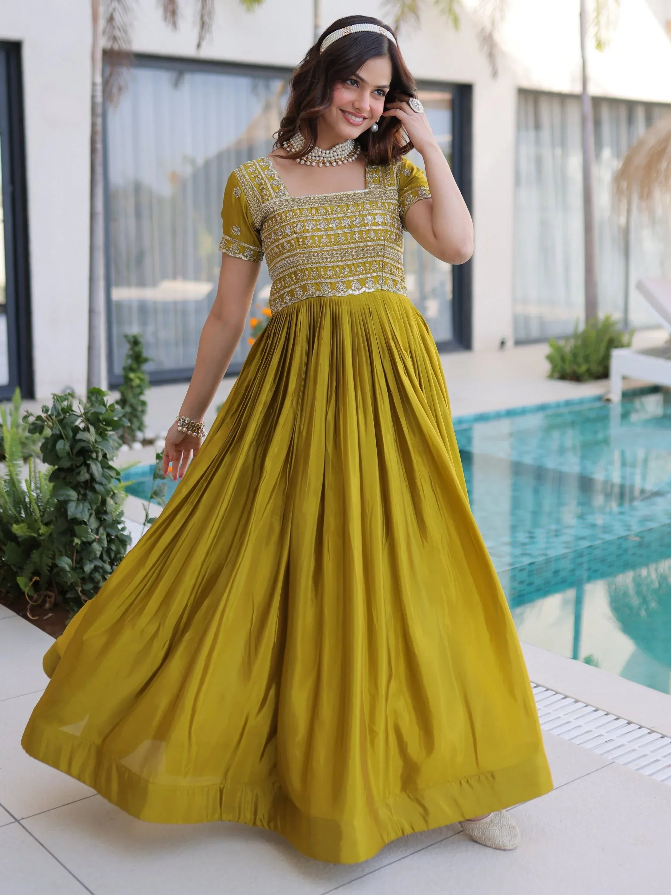 Astonishing Olive Green Zari Work Silk Mehendi Wear Gown