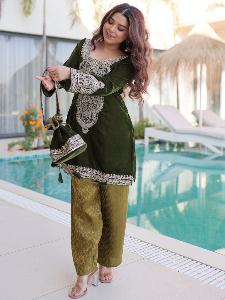 Attractive Green Embroidered Velvet Festival Wear Salwar Kameez