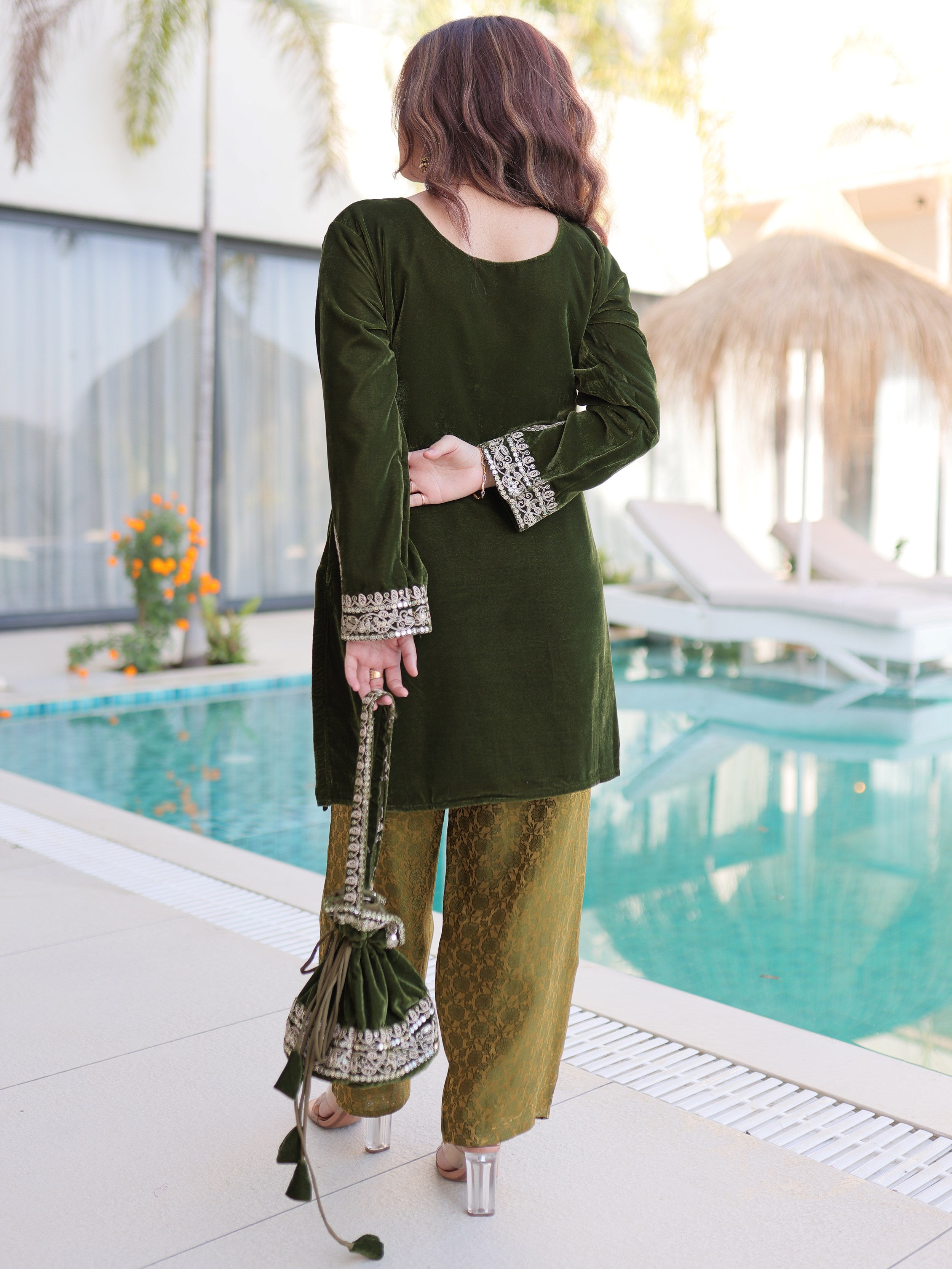Attractive Green Embroidered Velvet Festival Wear Salwar Kameez