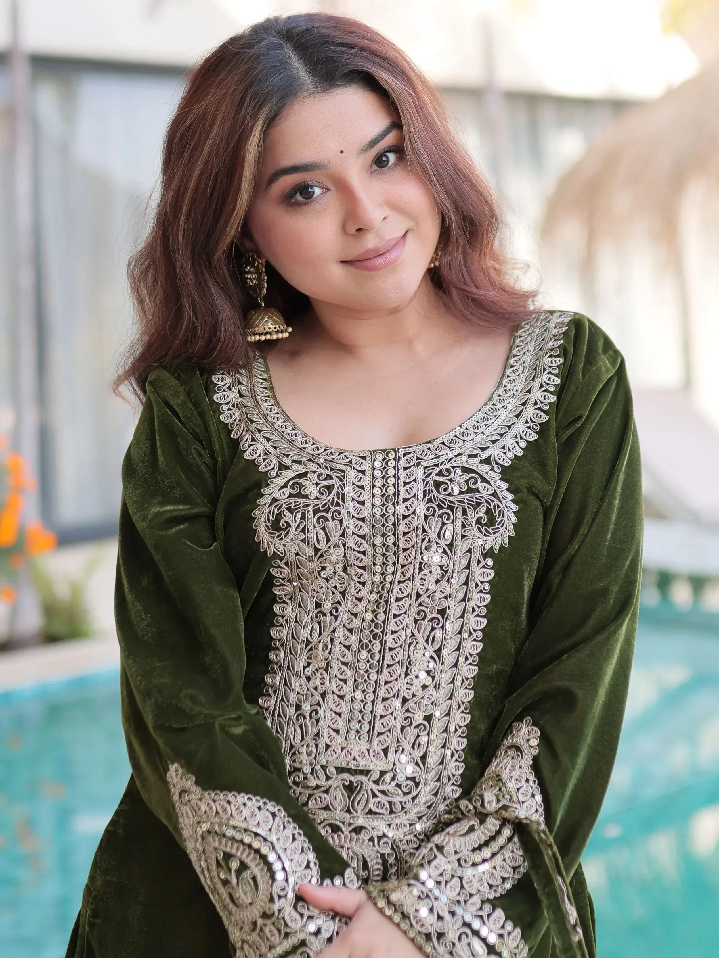 Attractive Green Embroidered Velvet Festival Wear Salwar Kameez