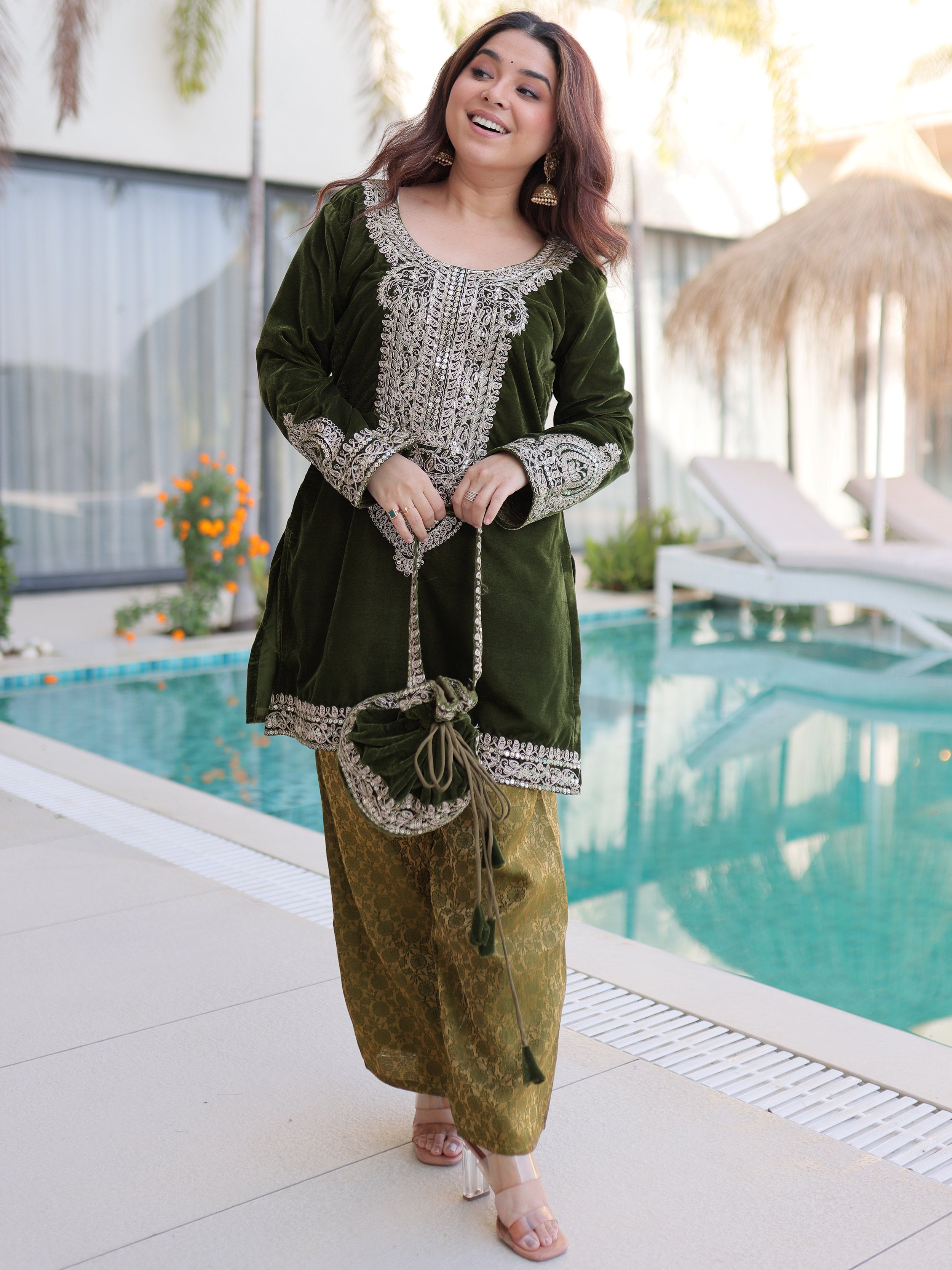 Attractive Green Embroidered Velvet Festival Wear Salwar Kameez