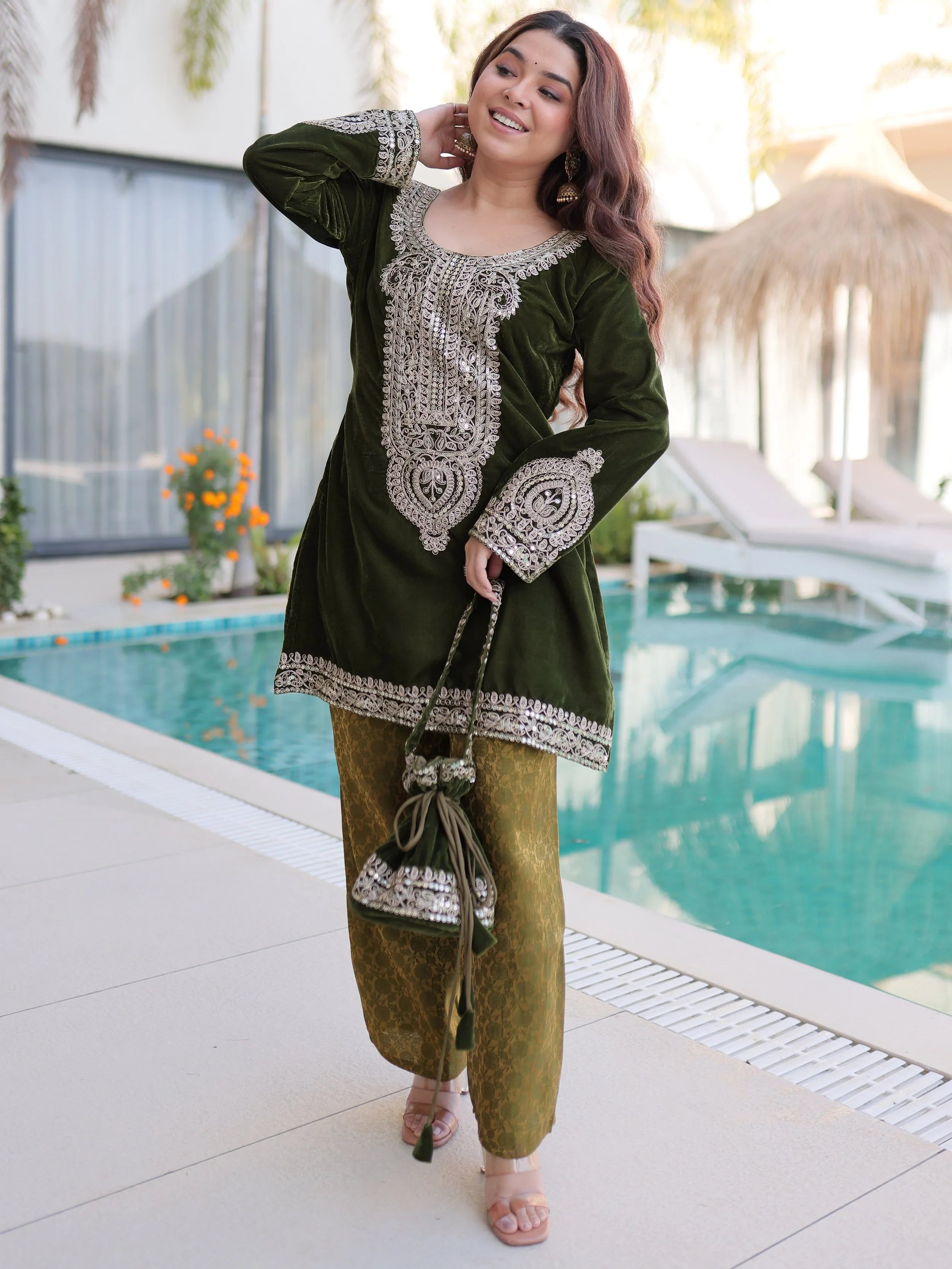 Attractive Green Embroidered Velvet Festival Wear Salwar Kameez
