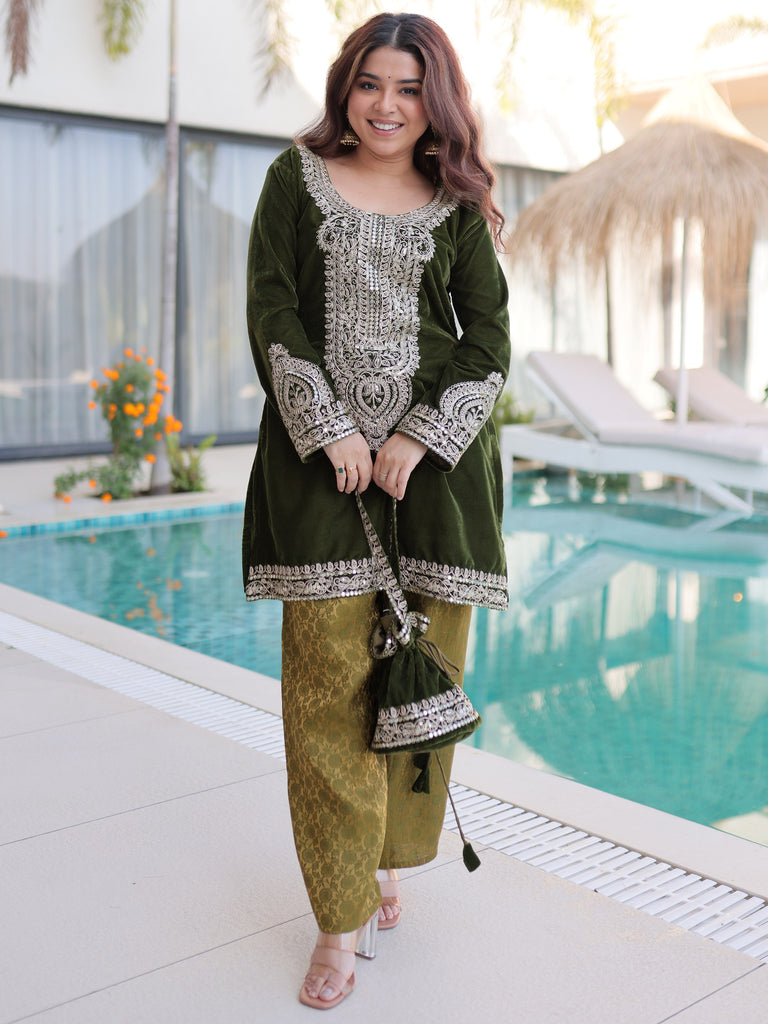 Attractive Green Embroidered Velvet Festival Wear Salwar Kameez