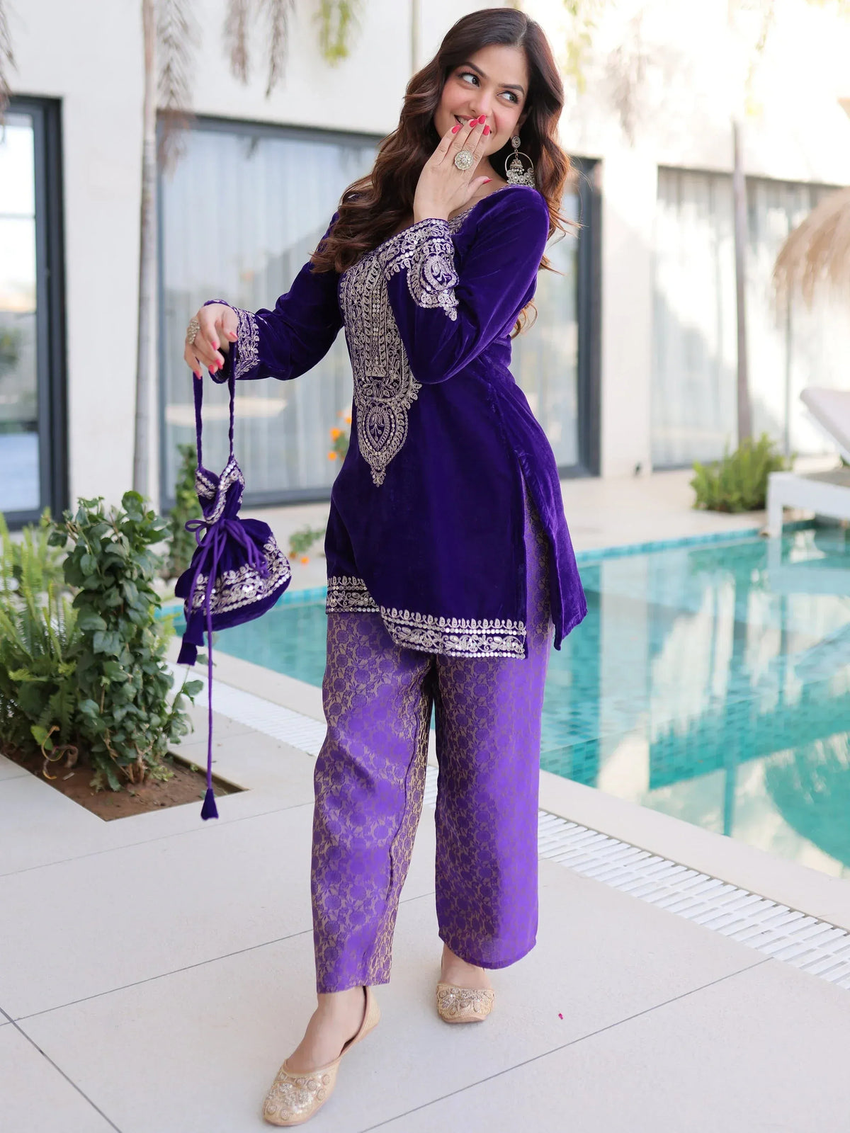 Purple velvet embroidered kurta with patterned palazzo pants, perfect for Indian ethnic wear occasions.