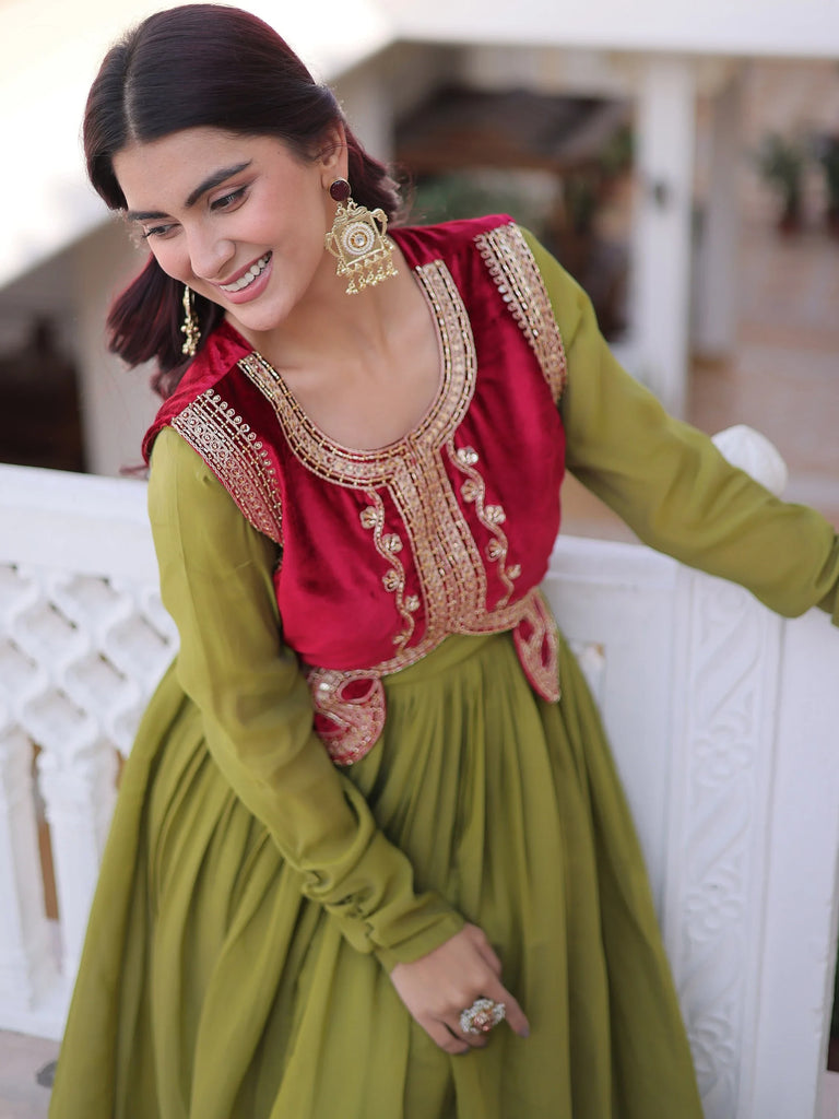 Beautiful Pista Green Function Wear Gown With Embroidered Koti  