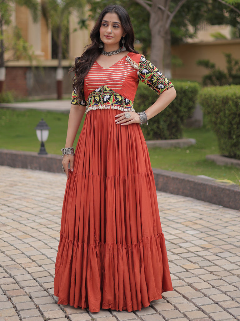 Astonishing Rust Orange Kutchi Work Rayon Navratri Wear Gown