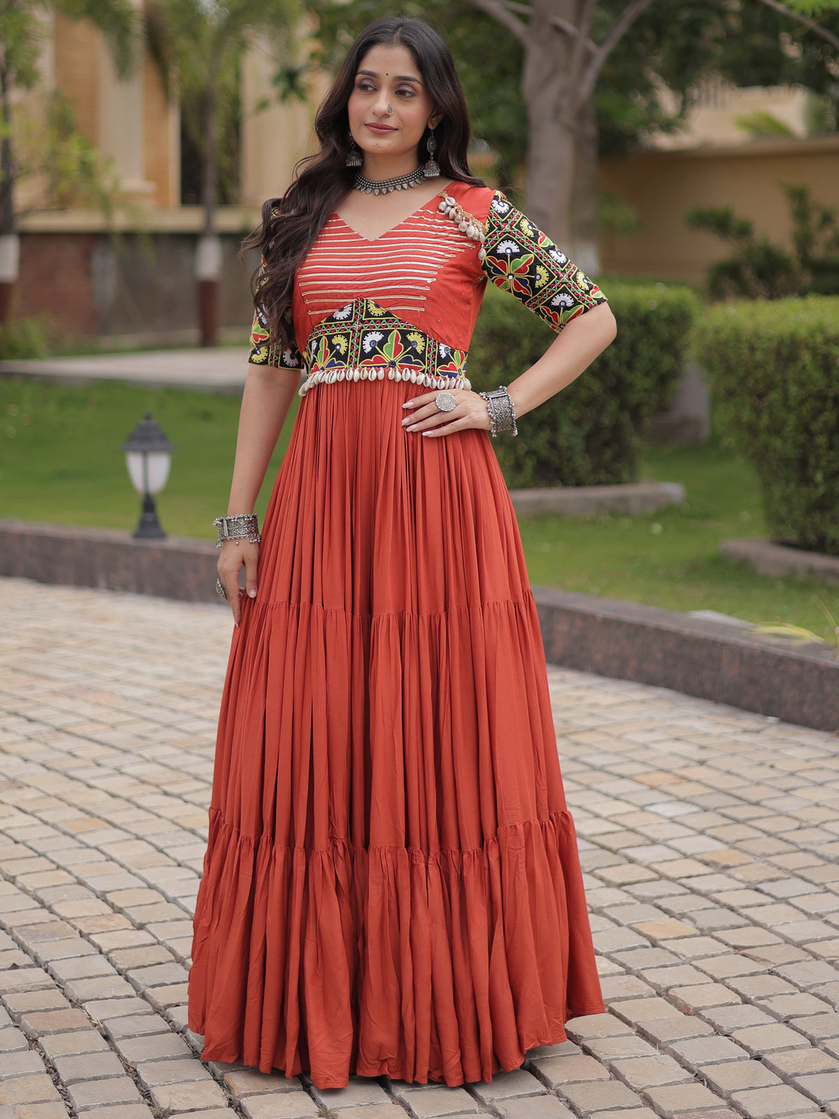 Astonishing Rust Orange Kutchi Work Rayon Navratri Wear Gown