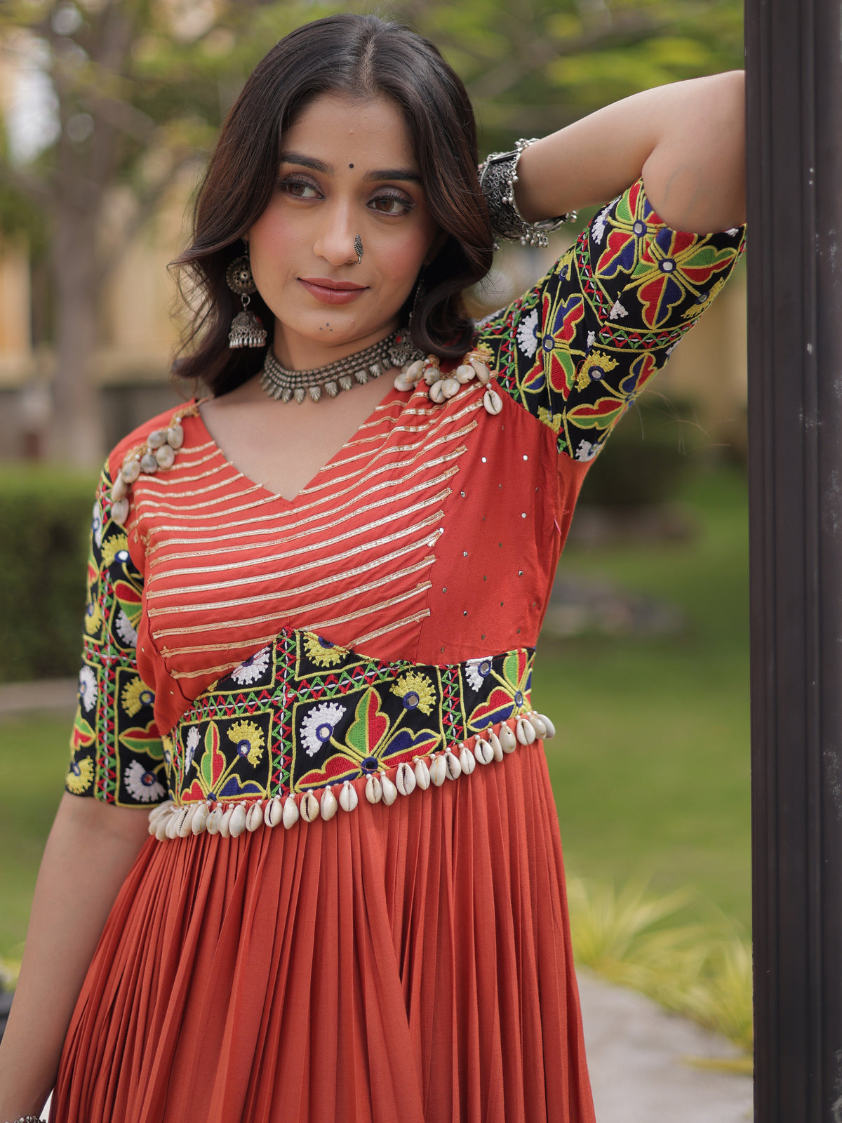 Astonishing Rust Orange Kutchi Work Rayon Navratri Wear Gown