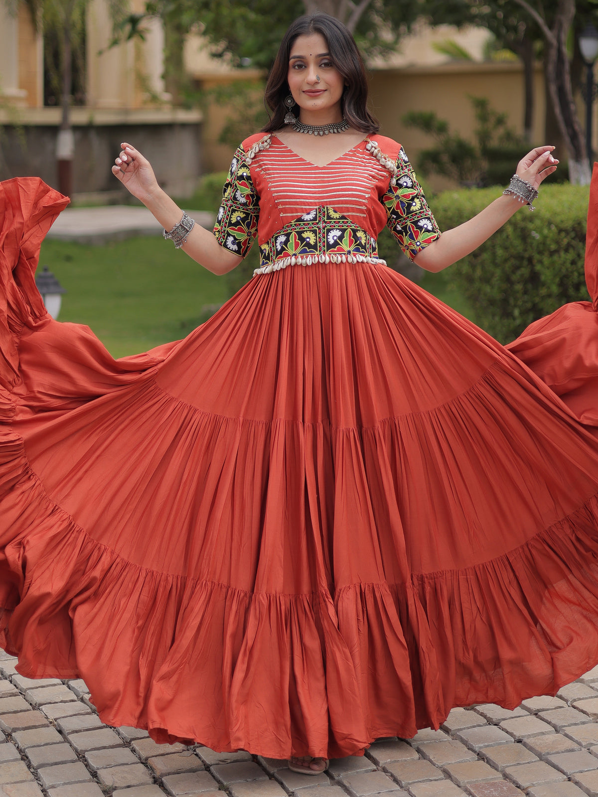 Astonishing Rust Orange Kutchi Work Rayon Navratri Wear Gown