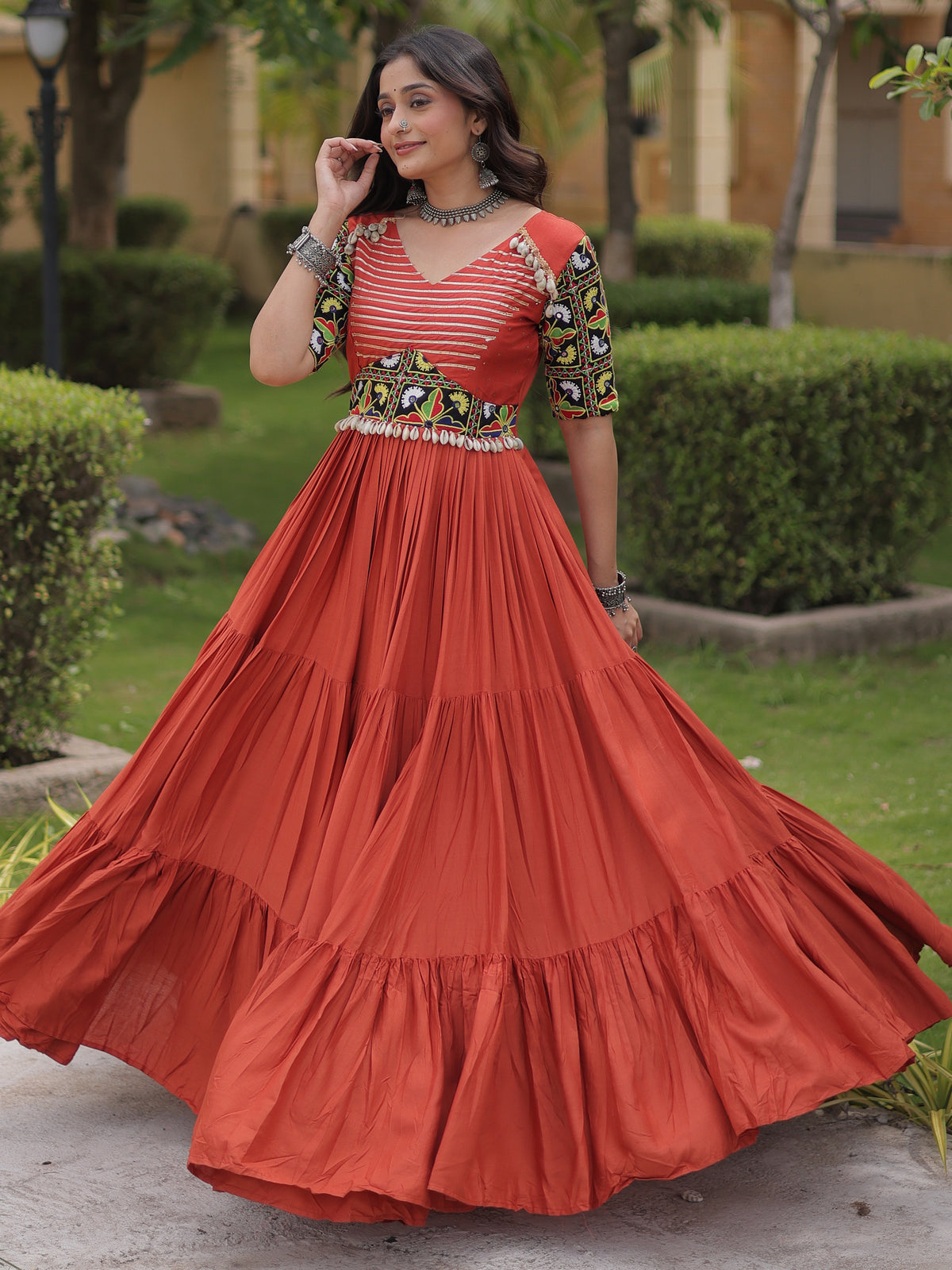Astonishing Rust Orange Kutchi Work Rayon Navratri Wear Gown