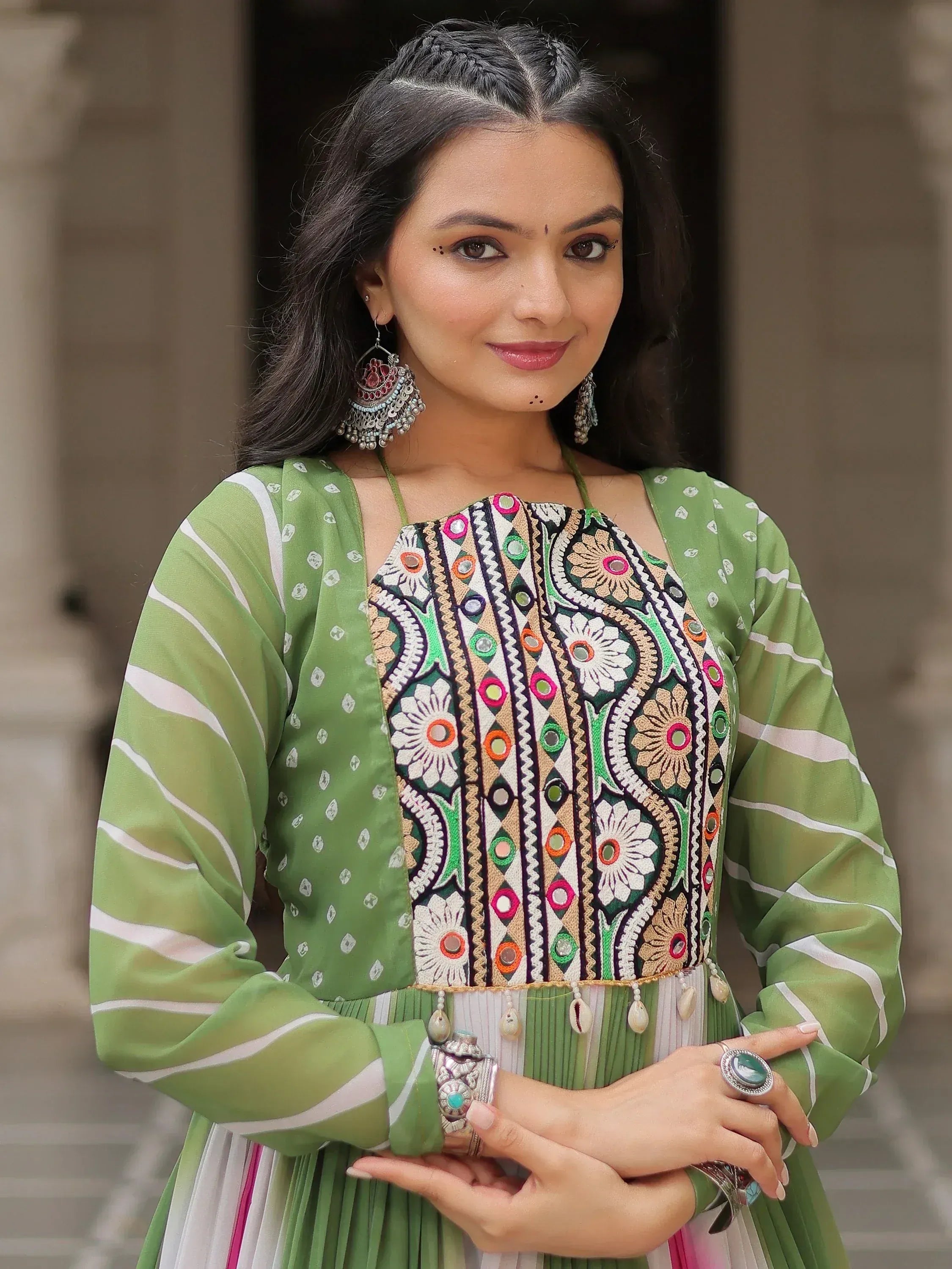 Green embroidered ethnic gown with mirror work, perfect for Indian occasions and festive wear