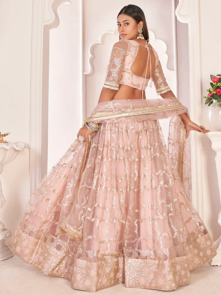 Prominent Pastel Pink Sequins Embroidery Net Lehenga Choli