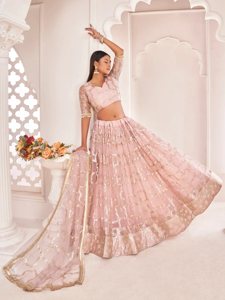 Prominent Pastel Pink Sequins Embroidery Net Lehenga Choli
