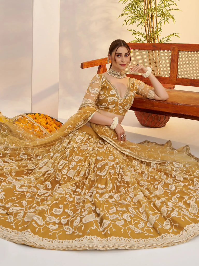 Superior Yellow Thread Embroidered Net Lehenga Choli With Dupatta