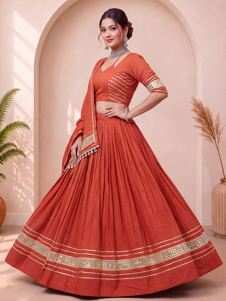 Stylish Rust Orange Mirror Laced Cotton Navratri Special Lehenga Choli