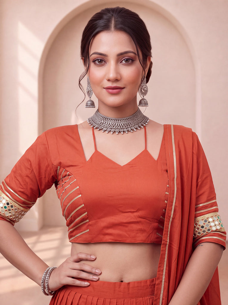 Stylish Rust Orange Mirror Laced Cotton Navratri Special Lehenga Choli