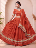 Stylish Rust Orange Mirror Laced Cotton Navratri Special Lehenga Choli