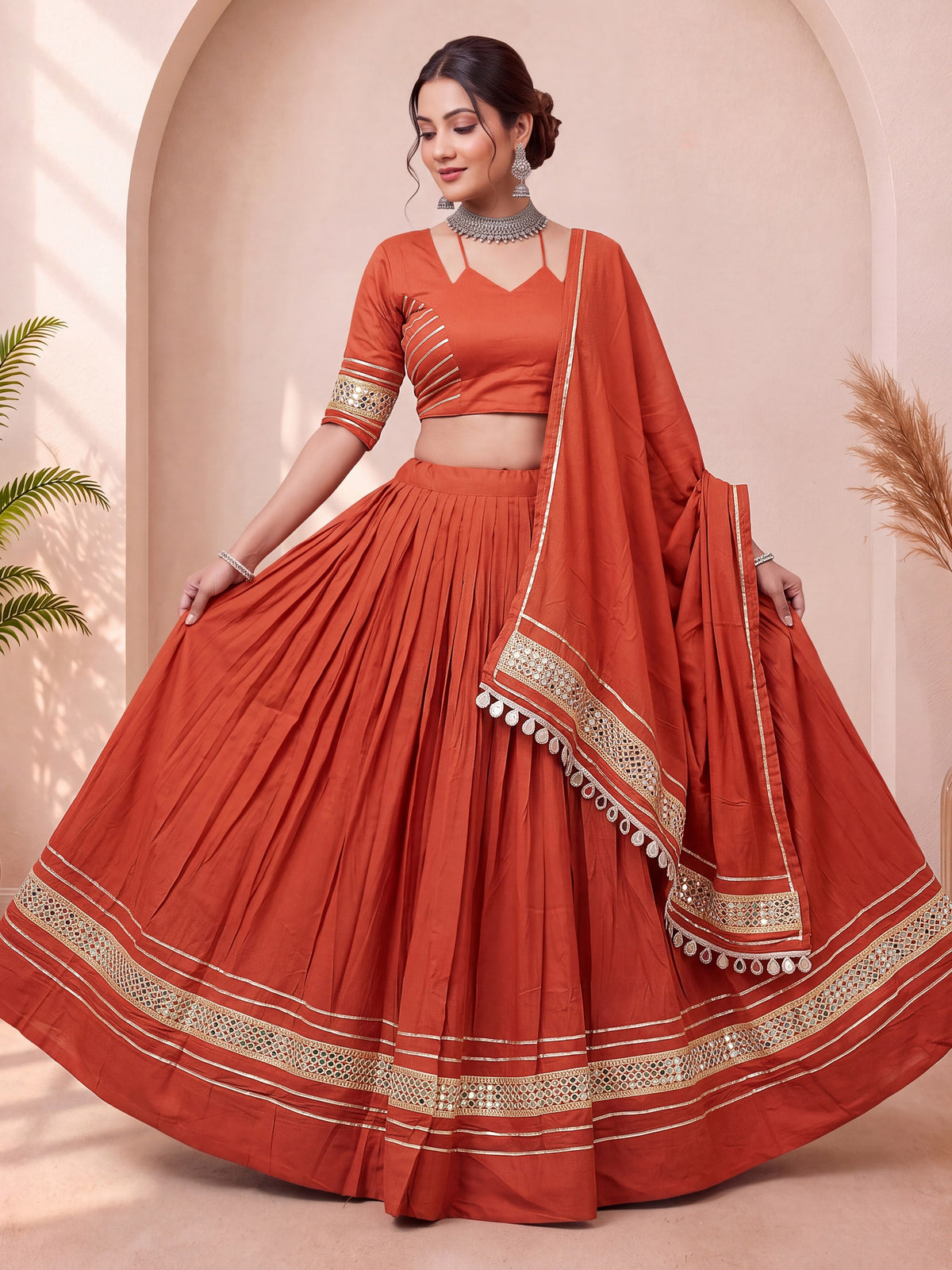 Stylish Rust Orange Mirror Laced Cotton Navratri Special Lehenga Choli