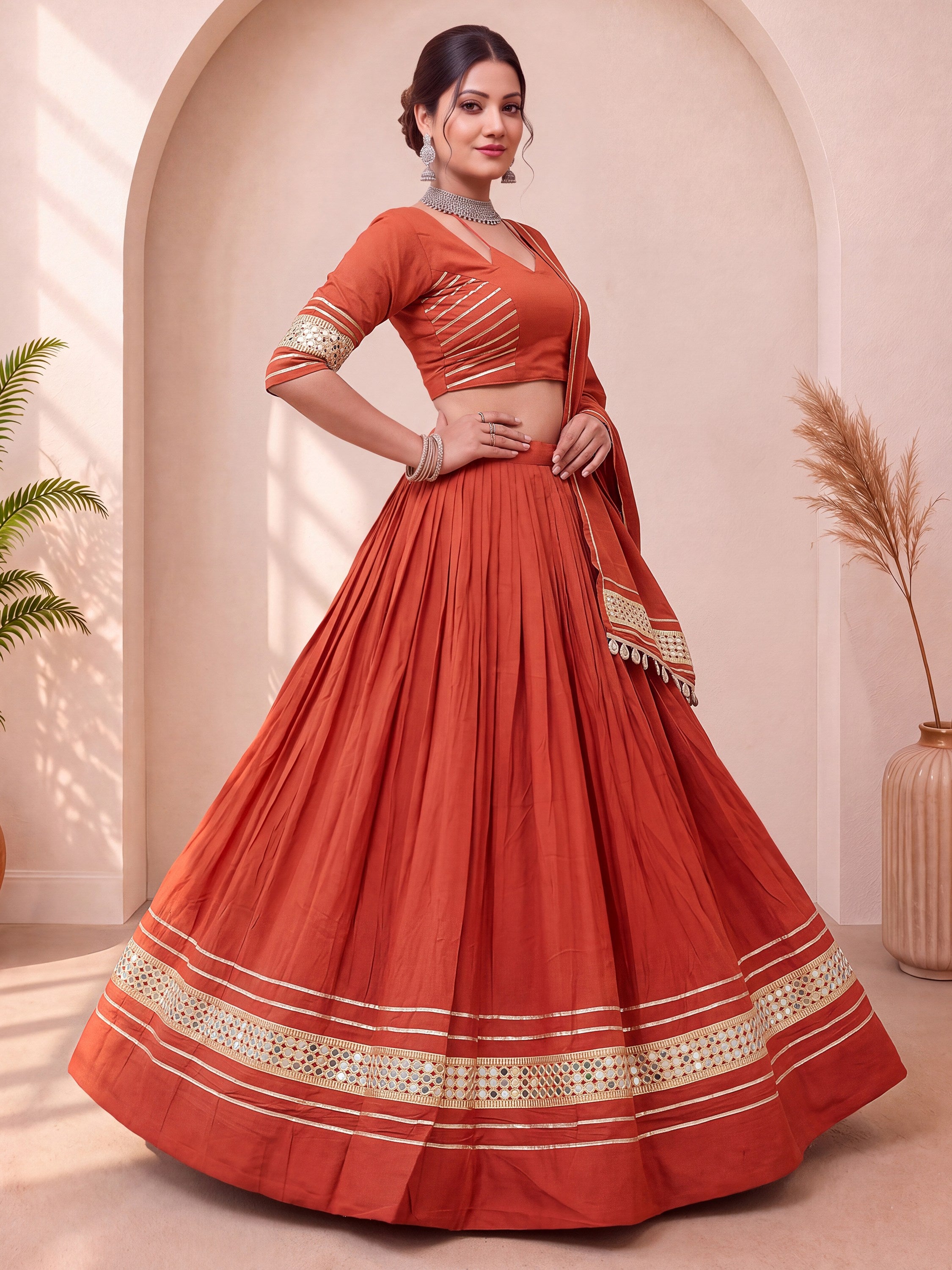 Stylish Rust Orange Mirror Laced Cotton Navratri Special Lehenga Choli