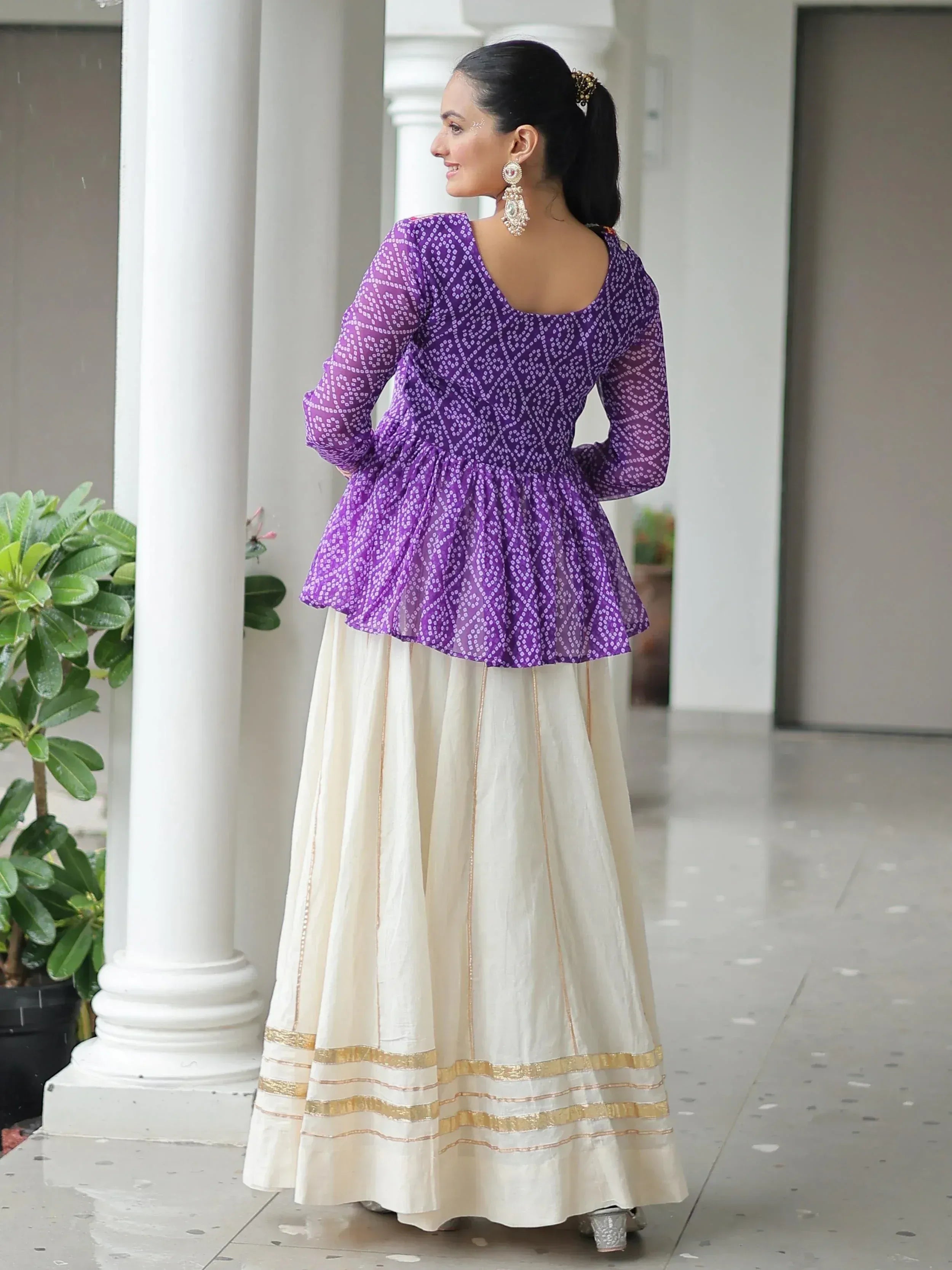 Purple printed peplum top with cream skirt, Indian ethnic wear for women