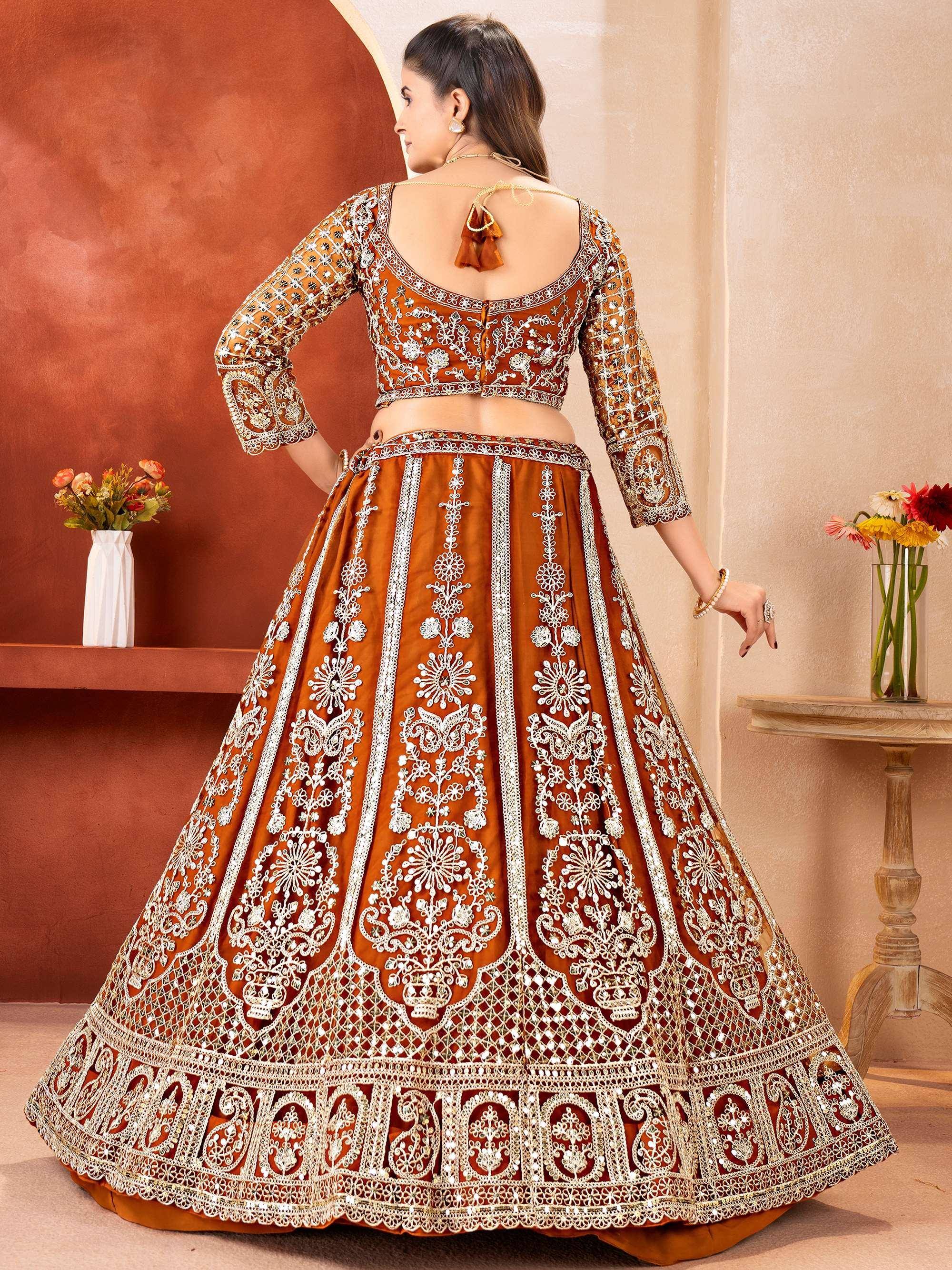 Fabulous Orange Embroidered Net Reception Wear Lehenga Choli