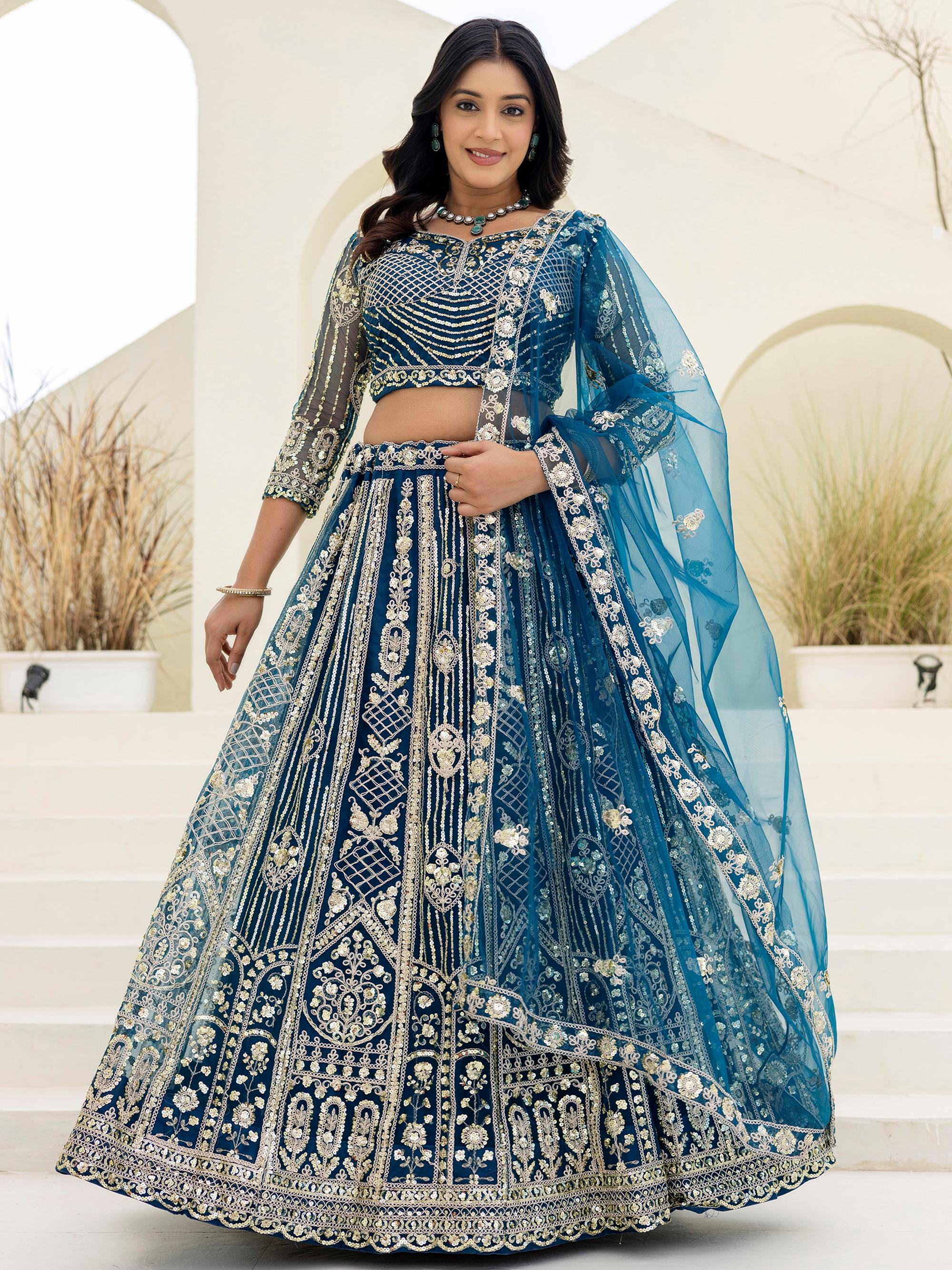 Amazing Blue Sequins Embroidered Net Party Wear Lehenga Choli
