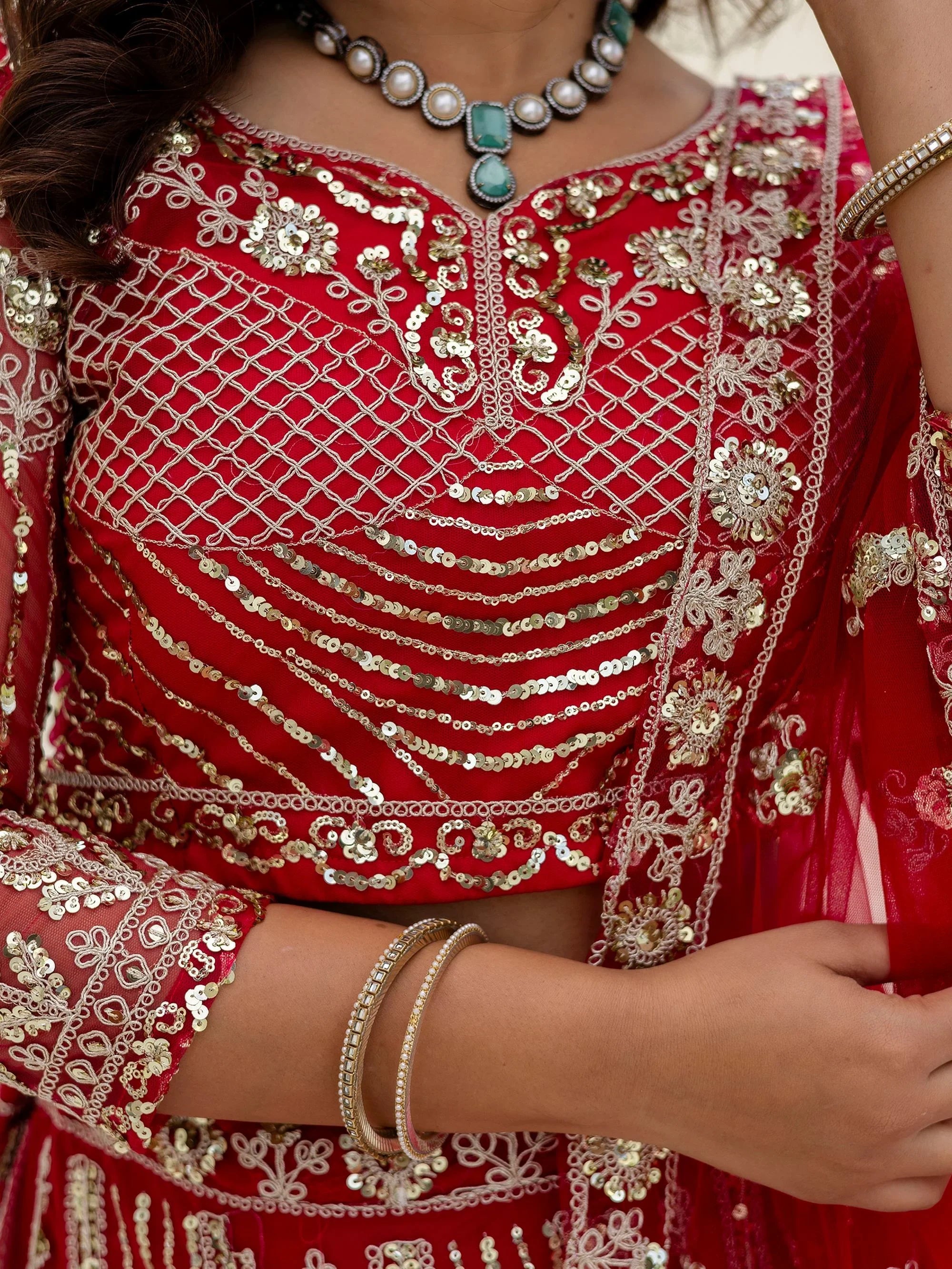 Charming Red Sequins Embroidered Net Reception Wear Lehenga Choli