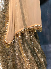 Bewitching Golden Net Sequins Work Lehenga Choli With Dupatta
