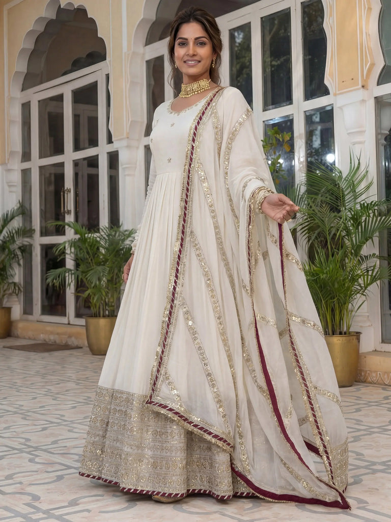 Gorgeous Off-White Embroidered Silk Wedding Wear Gown With Dupatta