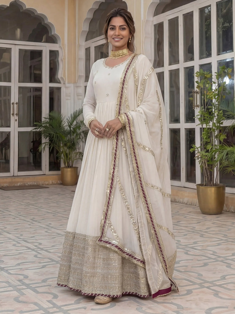 Gorgeous Off-White Embroidered Silk Wedding Wear Gown With Dupatta