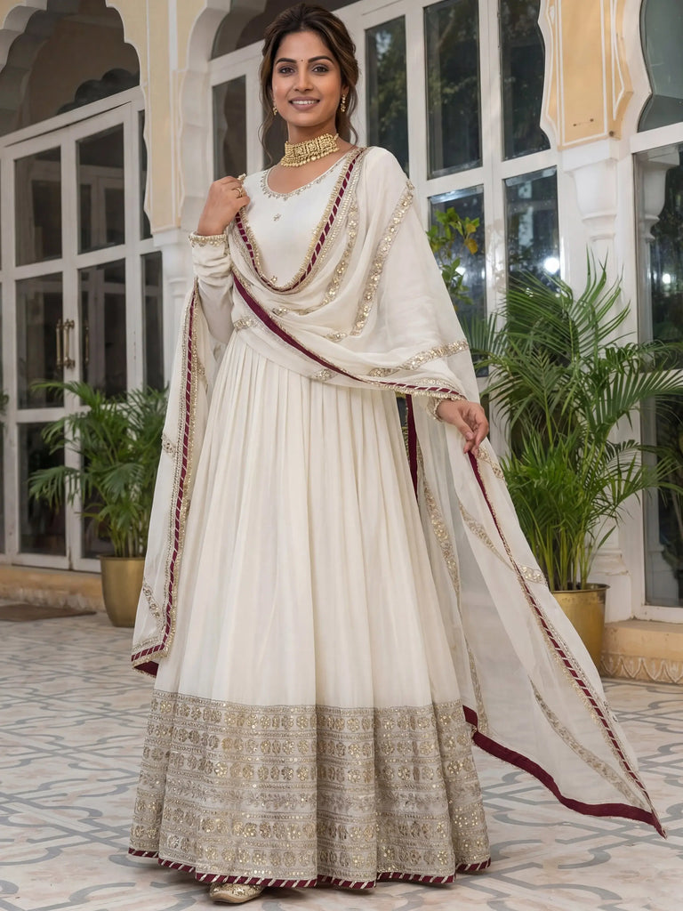Gorgeous Off-White Embroidered Silk Wedding Wear Gown With Dupatta