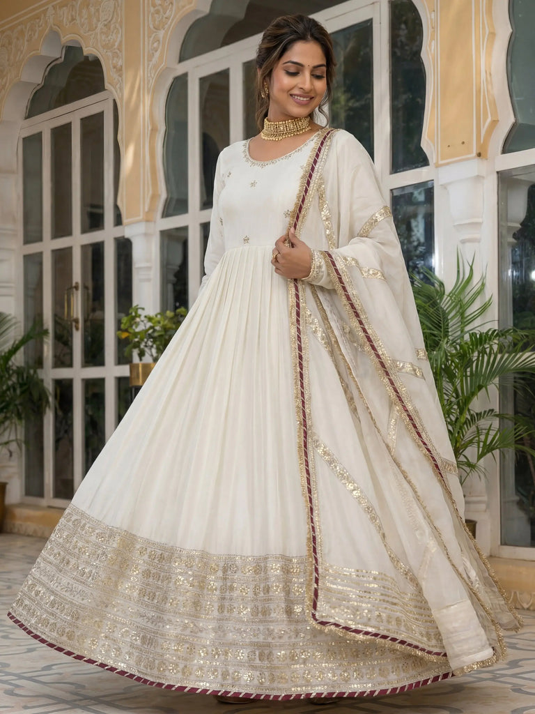 Gorgeous Off-White Embroidered Silk Wedding Wear Gown With Dupatta