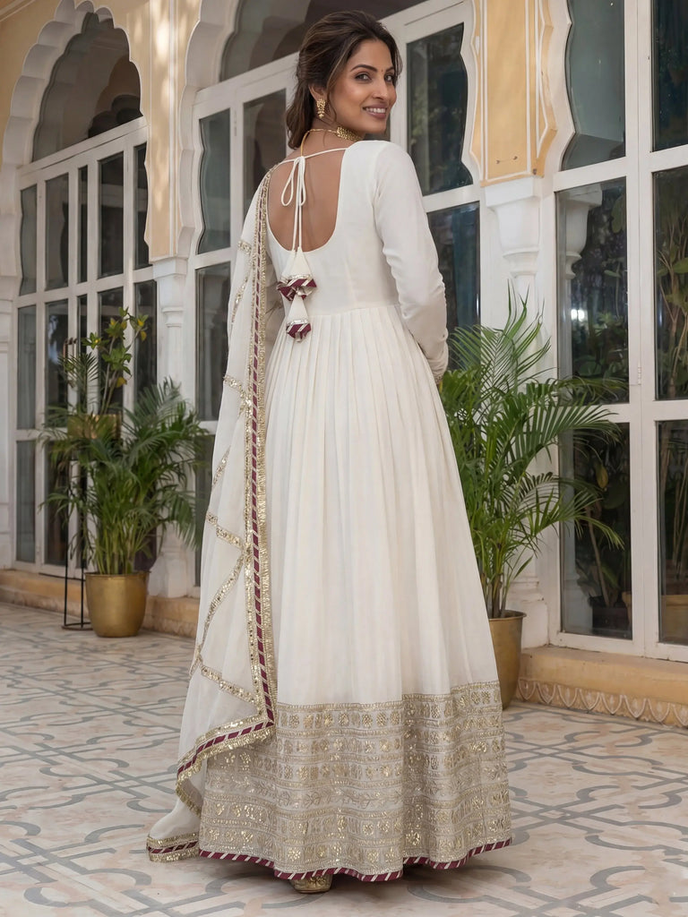 Gorgeous Off-White Embroidered Silk Wedding Wear Gown With Dupatta
