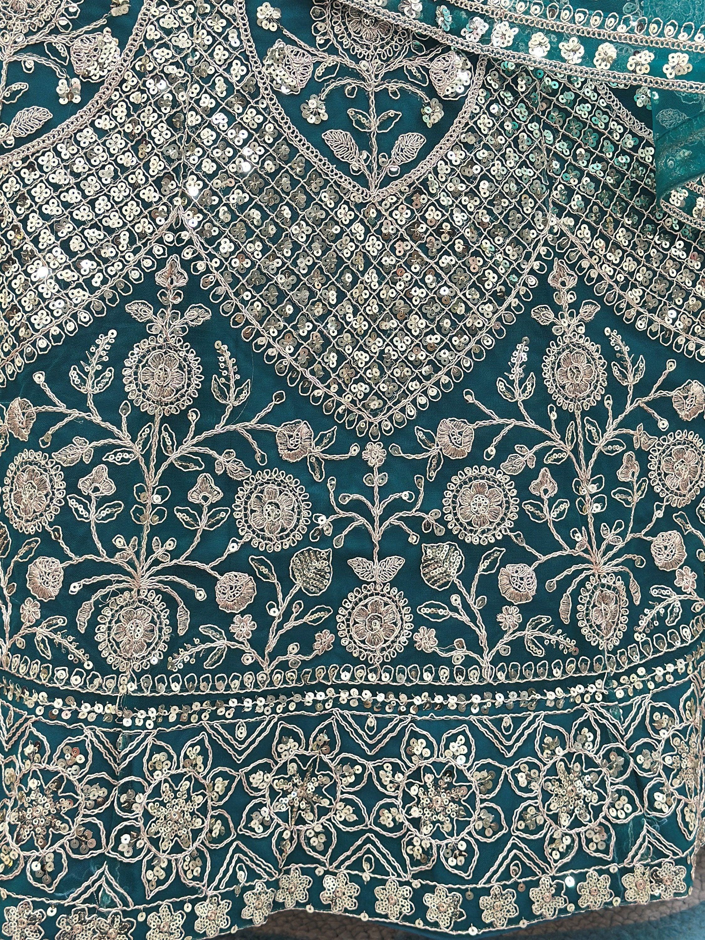 Notable Sea Green Sequins Net Reception Wear Lehenga Choli
