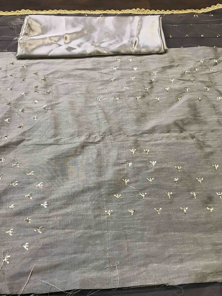 Tantalizing Grey Net Sequins Function Wear Saree With Blouse