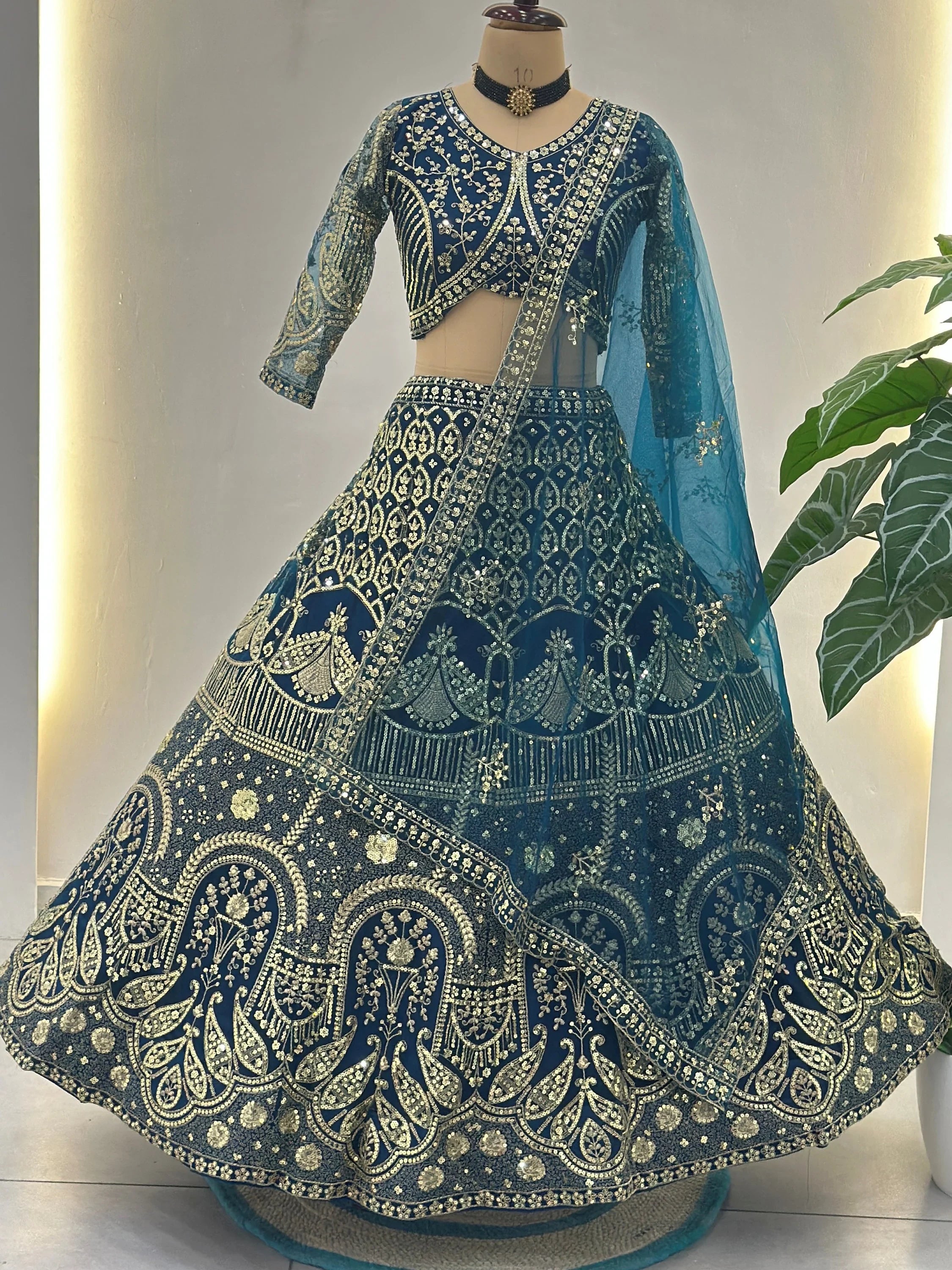 Captivating Blue Sequins Net Reception Wear Lehenga Choli