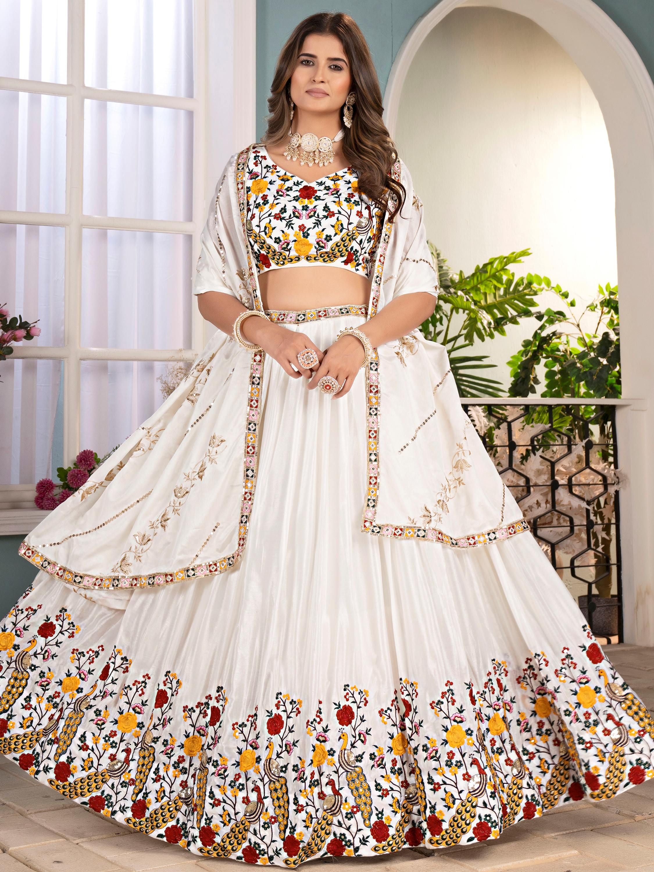 Fantastic Off-White Embroidered Net Wedding Wear Lehenga Choli