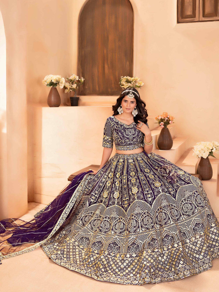 Enchanting Purple Zari Embroidered Net Reception Wear Lehenga Choli