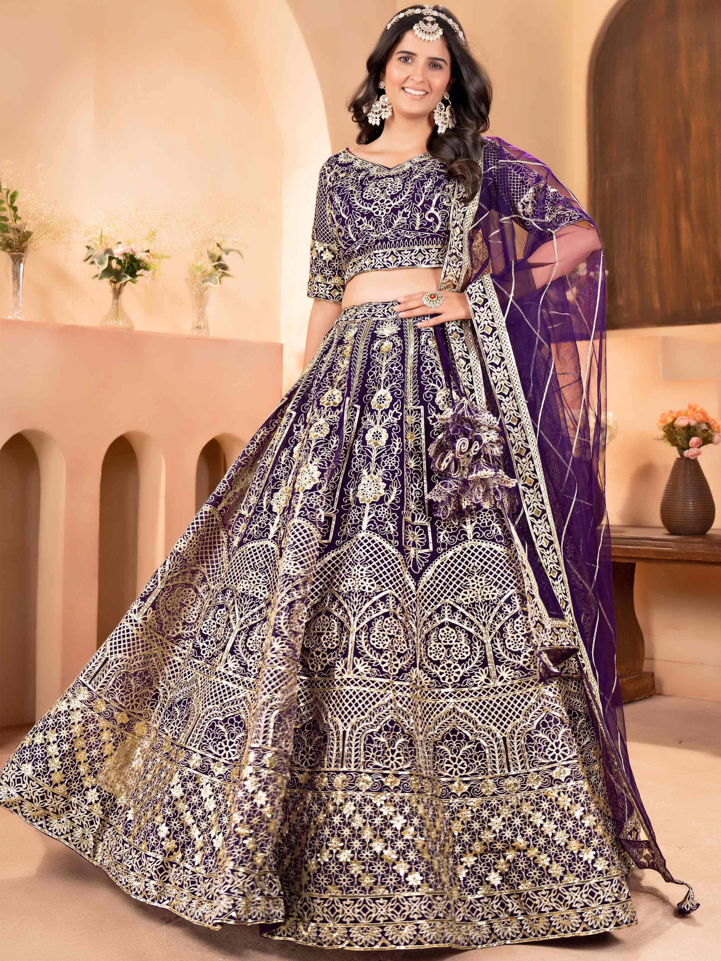 Enchanting Purple Zari Embroidered Net Reception Wear Lehenga Choli