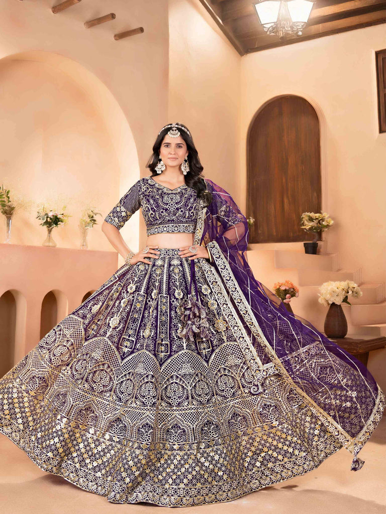 Enchanting Purple Zari Embroidered Net Reception Wear Lehenga Choli